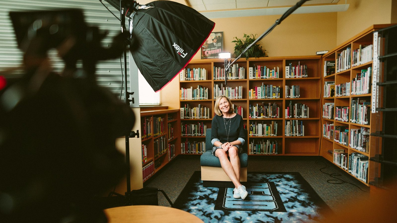 Interview set with a camera and soft light in a library